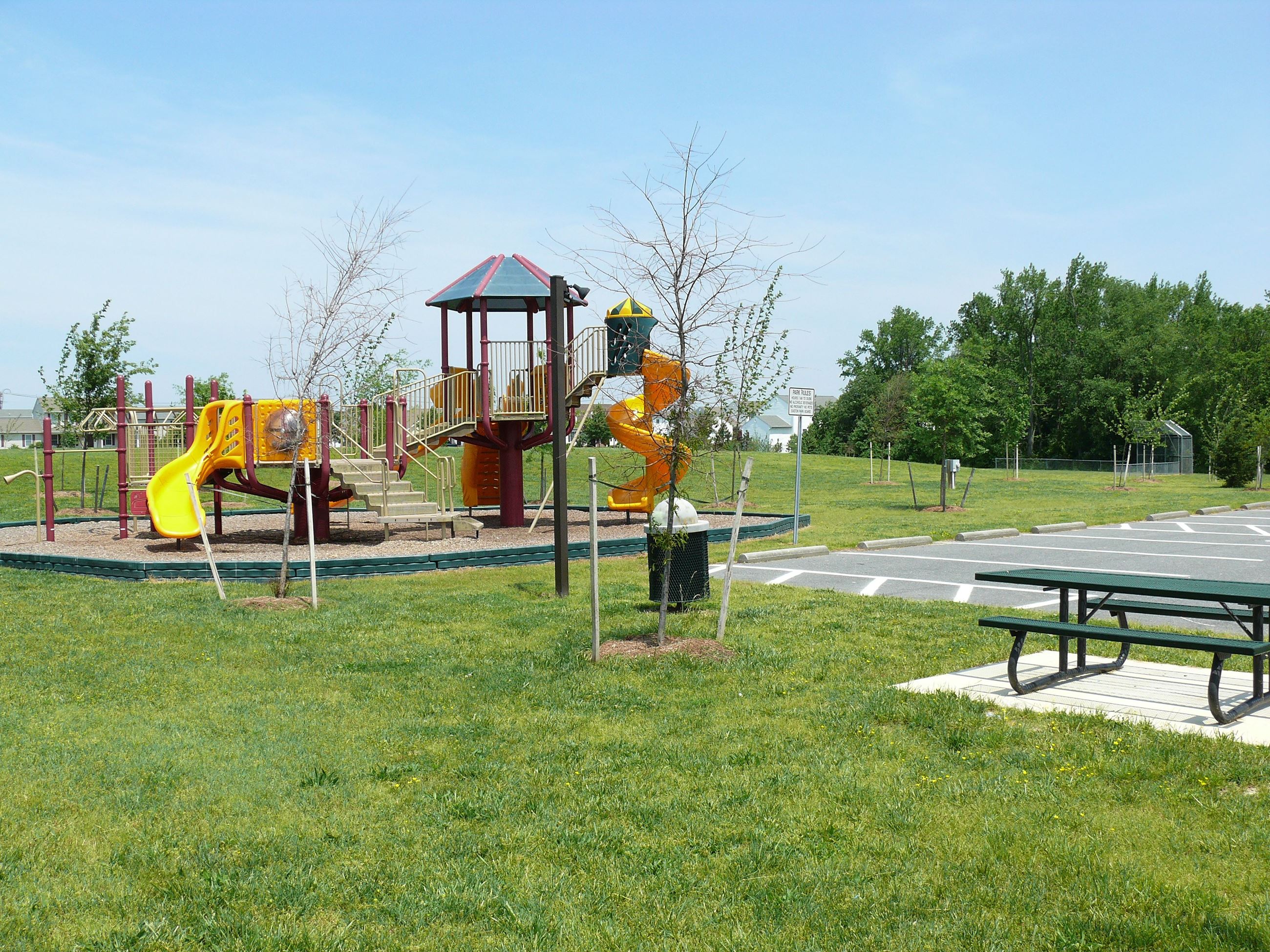 Playground at the Corner of the Parking Lot