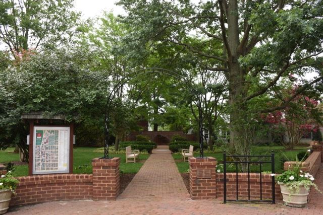 Brick and Iron Trellis at the Front of the Park